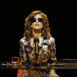 Elton John e James Taylor: chuva e muita emoção